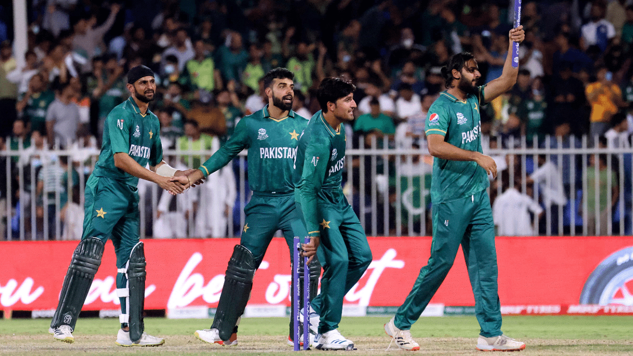 Pakistan's players celebrate at the end of the ICC men’s Twenty20 World Cup cricket match. Credit: AFP Photo