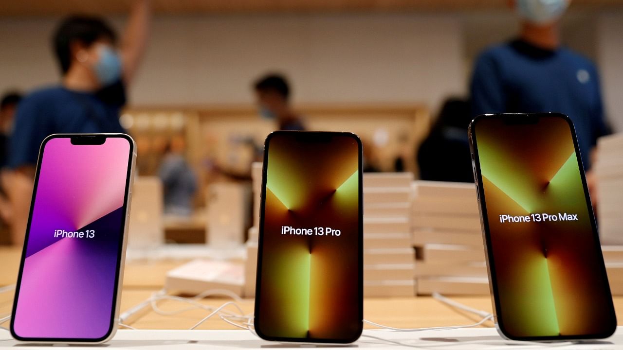 Apple's iPhone 13 models are pictured at an Apple Store on the day the new Apple iPhone 13 series goes on sale, in Beijing, China. Credit: Reuters File photo