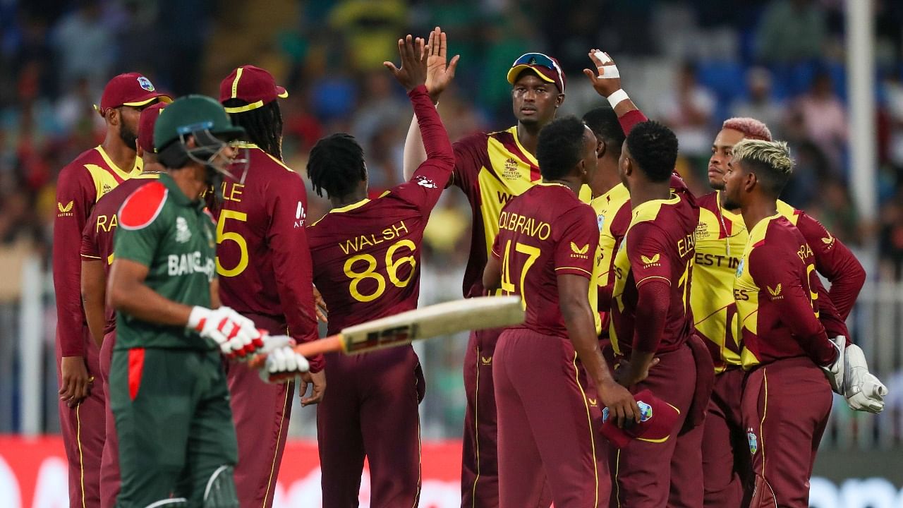 West Indies players celebrate the dismissal of Bangladesh's Liton Das. Credit: AP Photo