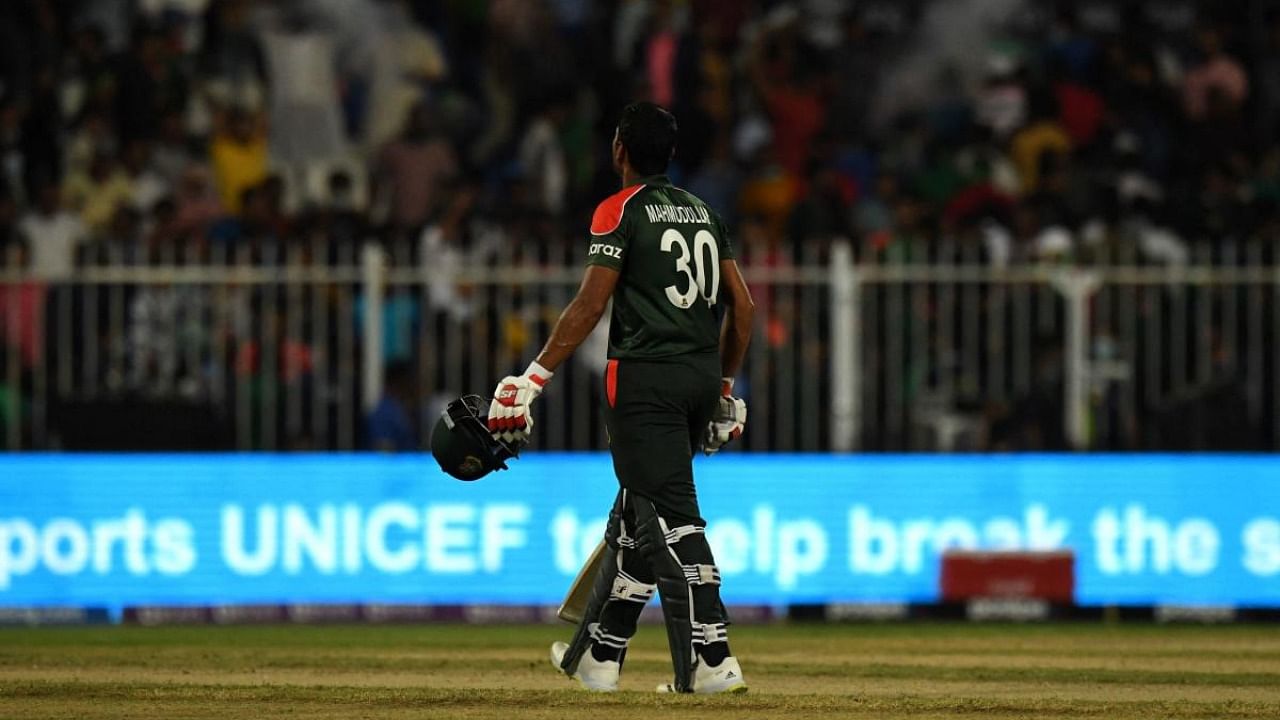 Bangladesh's captain Mahmudullah walks back to the pavilion at the end of the ICC men’s Twenty20 World Cup cricket match between Bangladesh and West Indies at the Sharjah Cricket Stadium. Credit: AFP Photo
