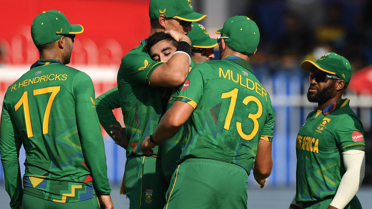 South Africa's Tabraiz Shamsi (C) celebrates with teammates after taking the wicket of Sri Lanka's Avishka Fernando. Credit: AFP Photo