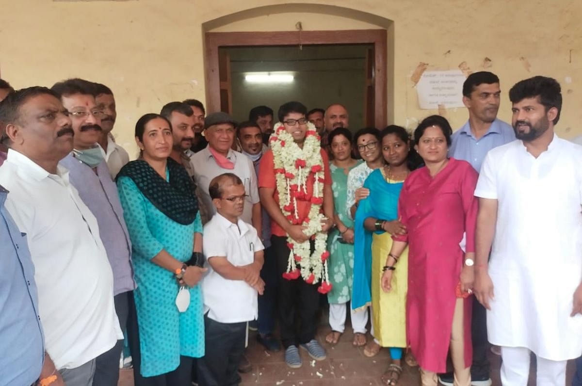 Vinank Kuttappa who was elected as the vice president of Virajpet Town Panchayat was greeted by MP Pratap Simha, MLA K G Bopaiah and other BJP members of the panchayat.