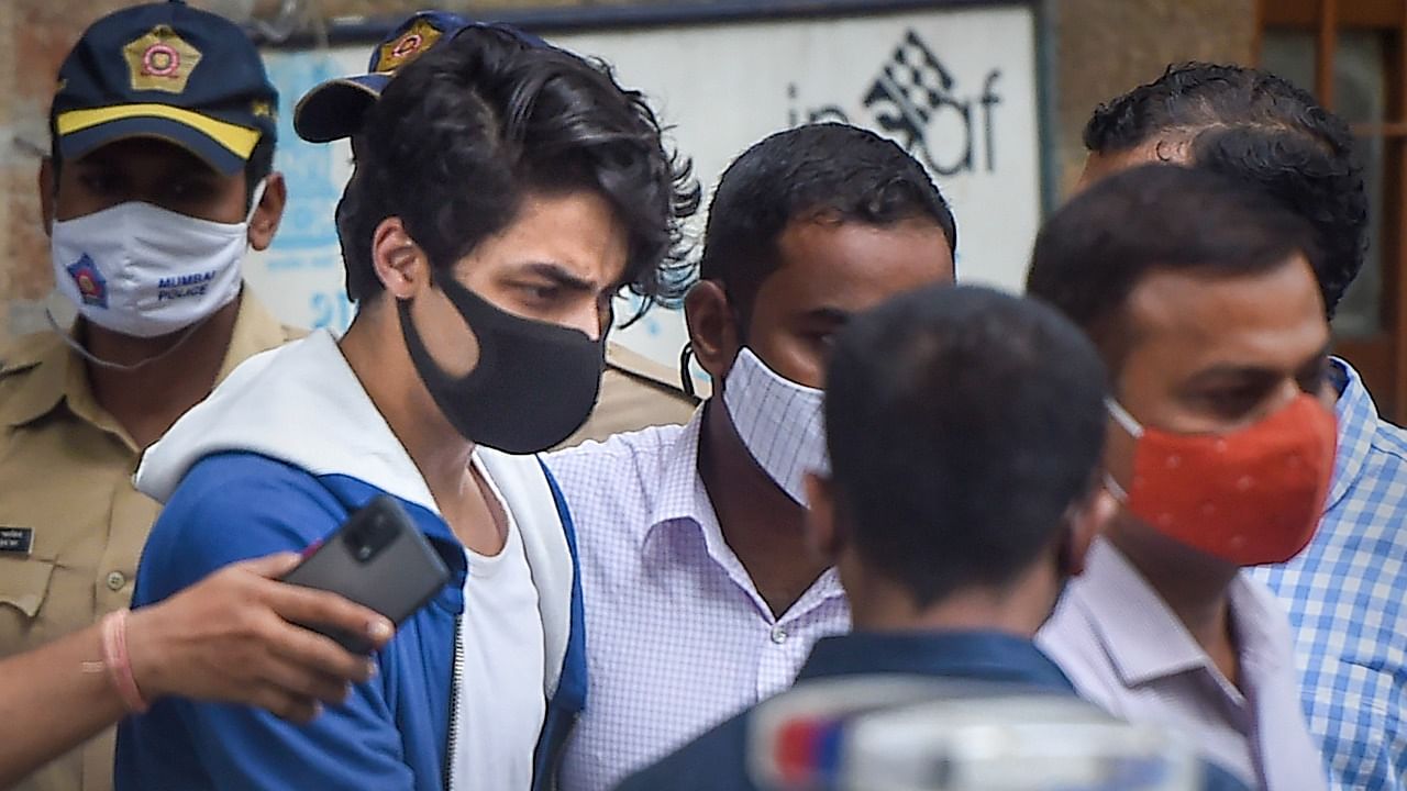 Bollywood actor Shah Rukh Khan's son Aryan Khan being taken to Arthur Road jail from Narcotics Control Bureau (NCB) office after being arrested in connection with the alleged seizure of banned drugs from a cruise ship, in Mumbai. Credit: PTI File Photo