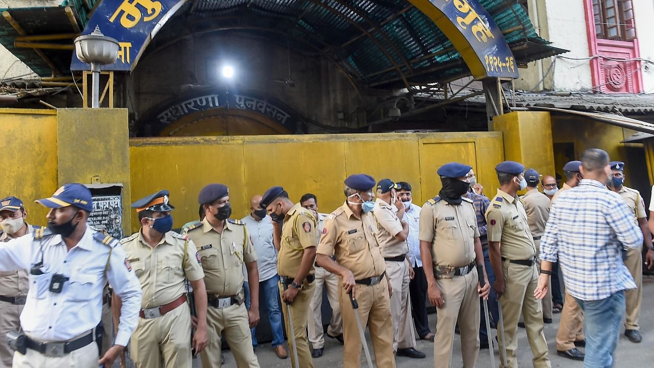 Police personnel stand outside the Arthur Road jail, where Aryan Khan, son of Bollywood actor Shah Rukh Khan, was kept in custody, in Mumbai, Friday. Credit: PTI File Photo