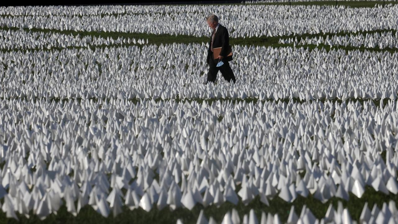 People visit Suzanne Brennan Firstenberg's "In America: Remember", a memorial for Americans who died due to the coronavirus disease. Credit: Reuters photo