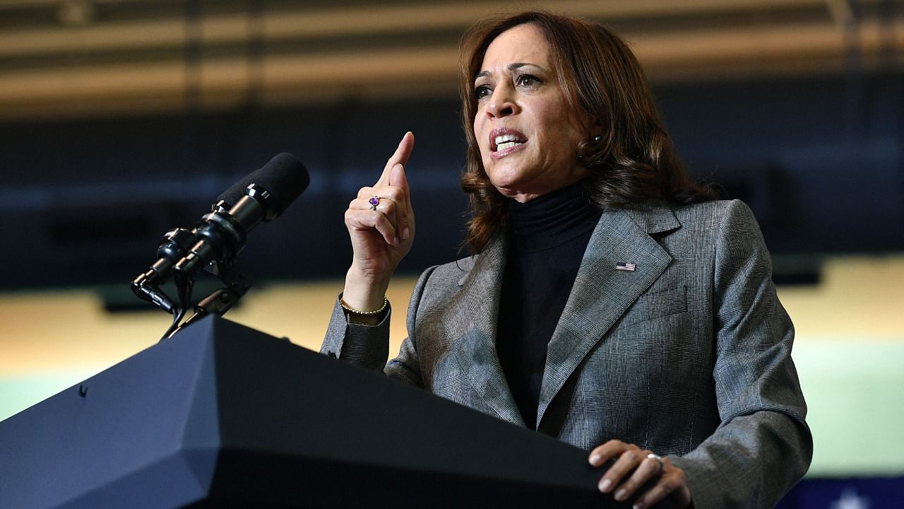 US Vice President Kamala Harris gestures as she speaks at a campaign rally for Virginia gubernatorial candidate Terry McAuliffe at the Peter G. Decker Half Moone Center in Norfolk, Virginia on October 29, 2021. Credit: AFP Photo