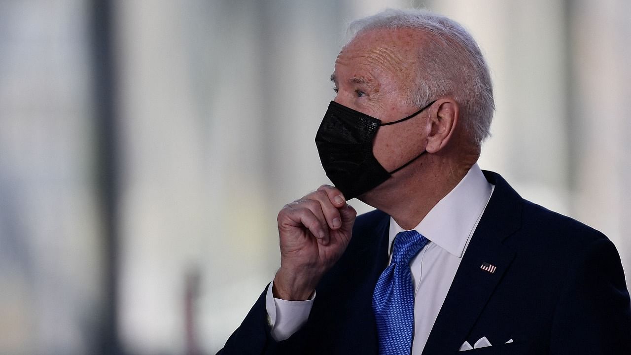 US President Joe Biden prepares to pose for a group photo of world leaders at the G20 of World Leaders Summit on October 30, 2021 at the convention center "La Nuvola" in the EUR district of Rome. Credit: AFP Photo