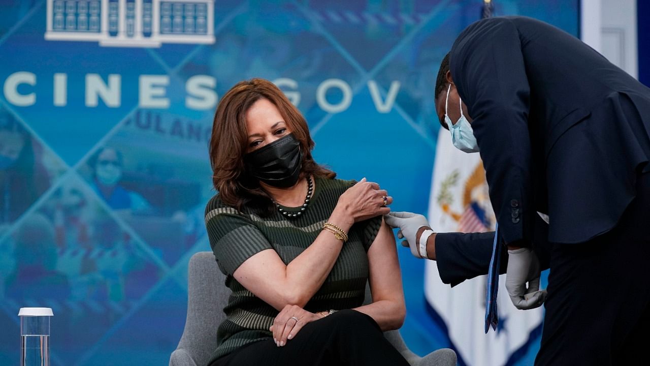 Vice President Kamala Harris prepares to receive her Moderna COVID-19 vaccine booster shot at the Eisenhower Executive Office Building on the White House complex. Credit: AP/PTI Photo