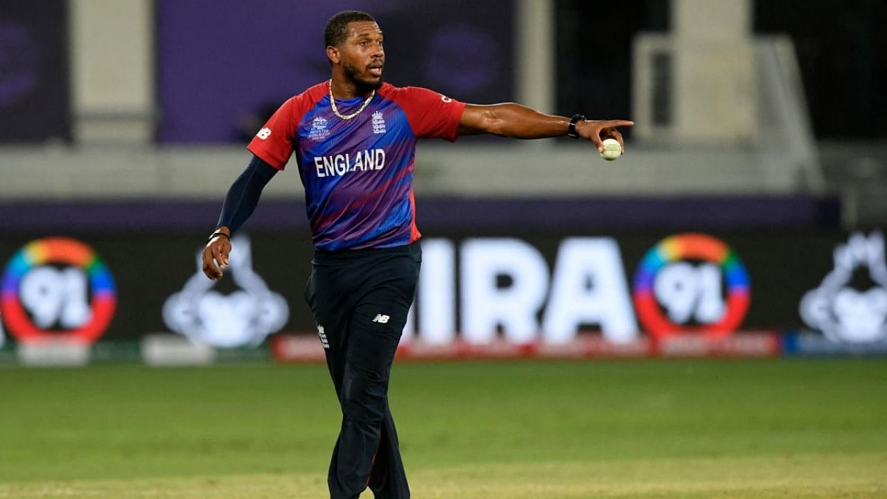 England's Chris Jordan adjusts the field during the ICC men’s Twenty20 World Cup cricket match between Australia and England at the Dubai International Cricket Stadium. Credit: AFP Photo