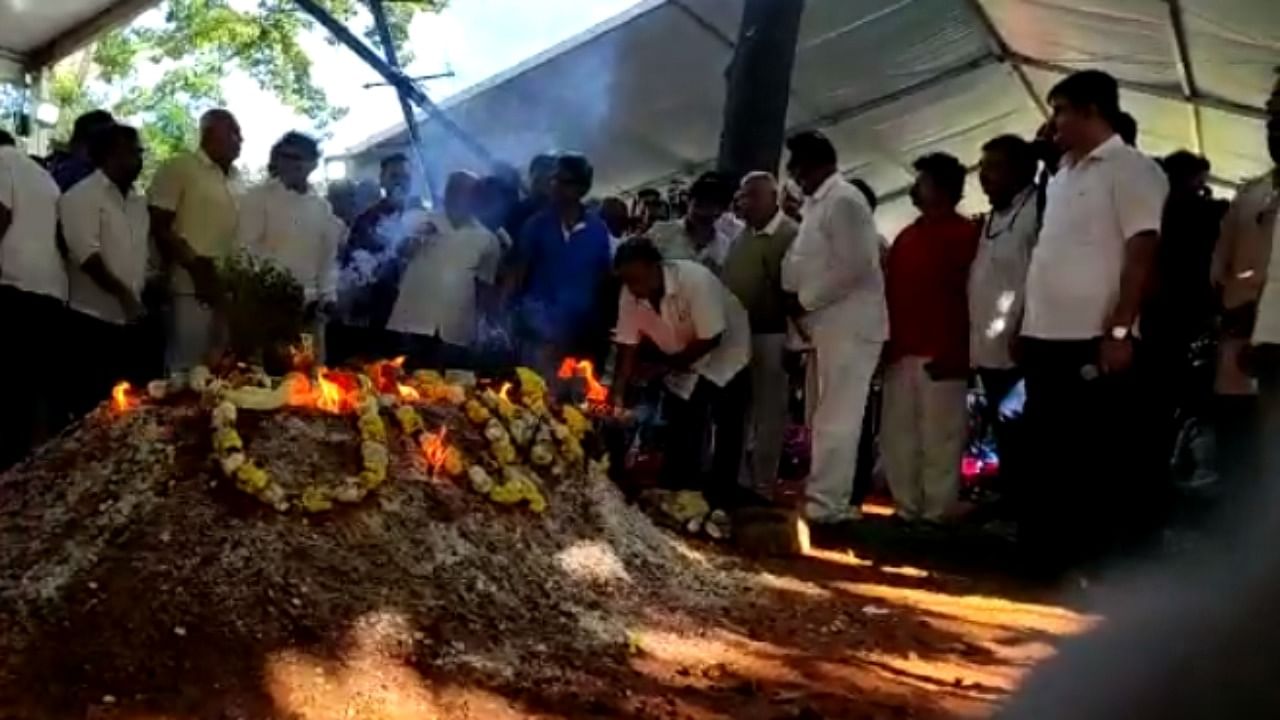 Puneeth Rajkumar was laid to rest at the Kanteerava Studio in Bengaluru, next to his father and mother, with full state honours on Sunday morning. Credit: DH Photo