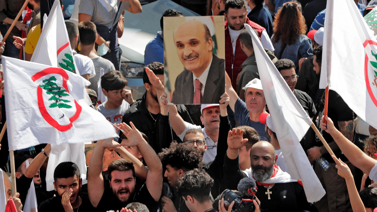 Supporters of the Lebanese Forces (LF) leader Samir Geagea gather in front of the ex-warlord's home in his mountain bastion of Maarab. Credit: AFP Photo