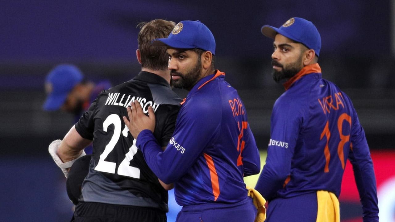 Virat Kohli with New Zealand's Kane Williamson after the match. Credit: Reuters photo