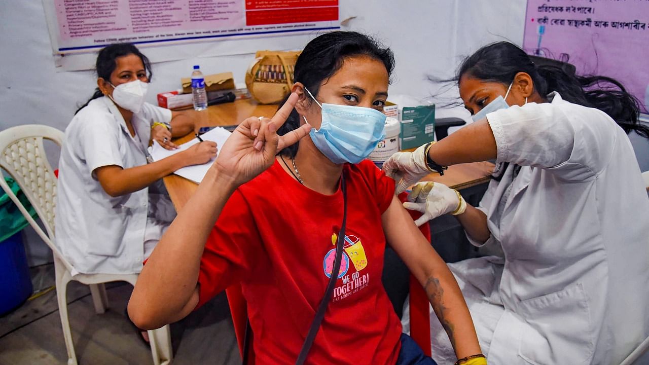 A nurse administers a dose of Covid-19 vaccine in Guwahati. Credit: PTI File Photo