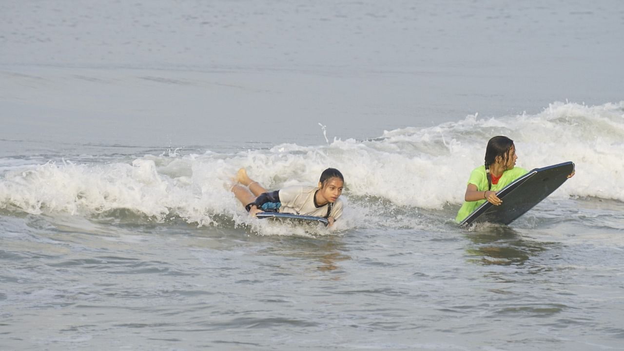 Surfers in action at Wave Runners – A Body Boarding Competition held at Tannirbavi beach on Sunday. Credit: Special arrangement