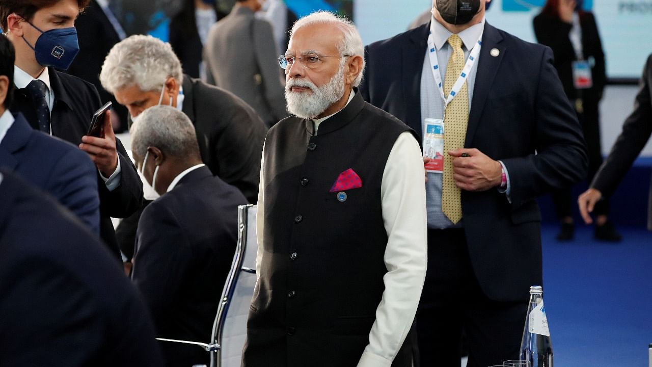 Prime Minister Narendra Modi arrives for a roundtable meeting during the G20 summit in Rome on October 30. Credit: AFP File Photo