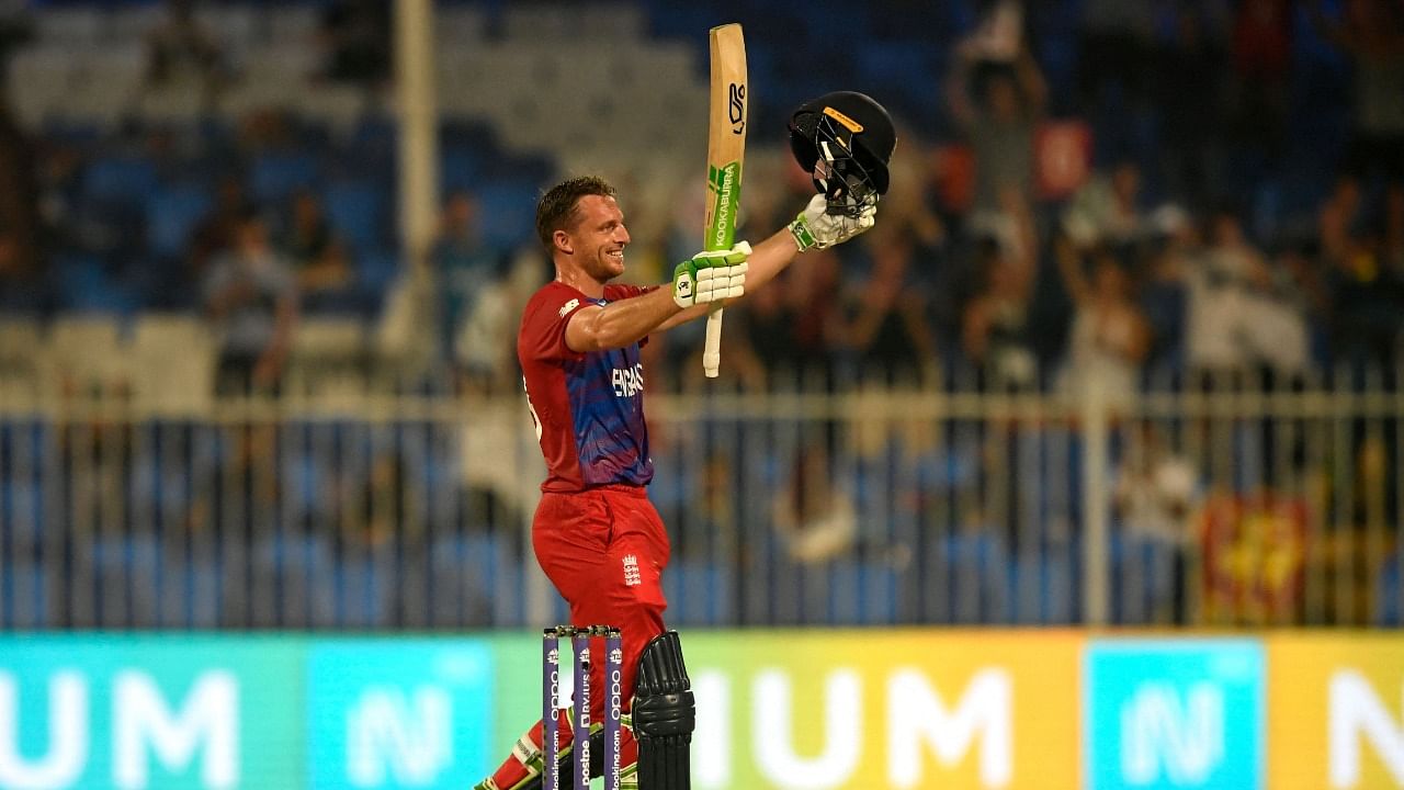 Jos Buttler celebrates his century. Credit: AFP Photo