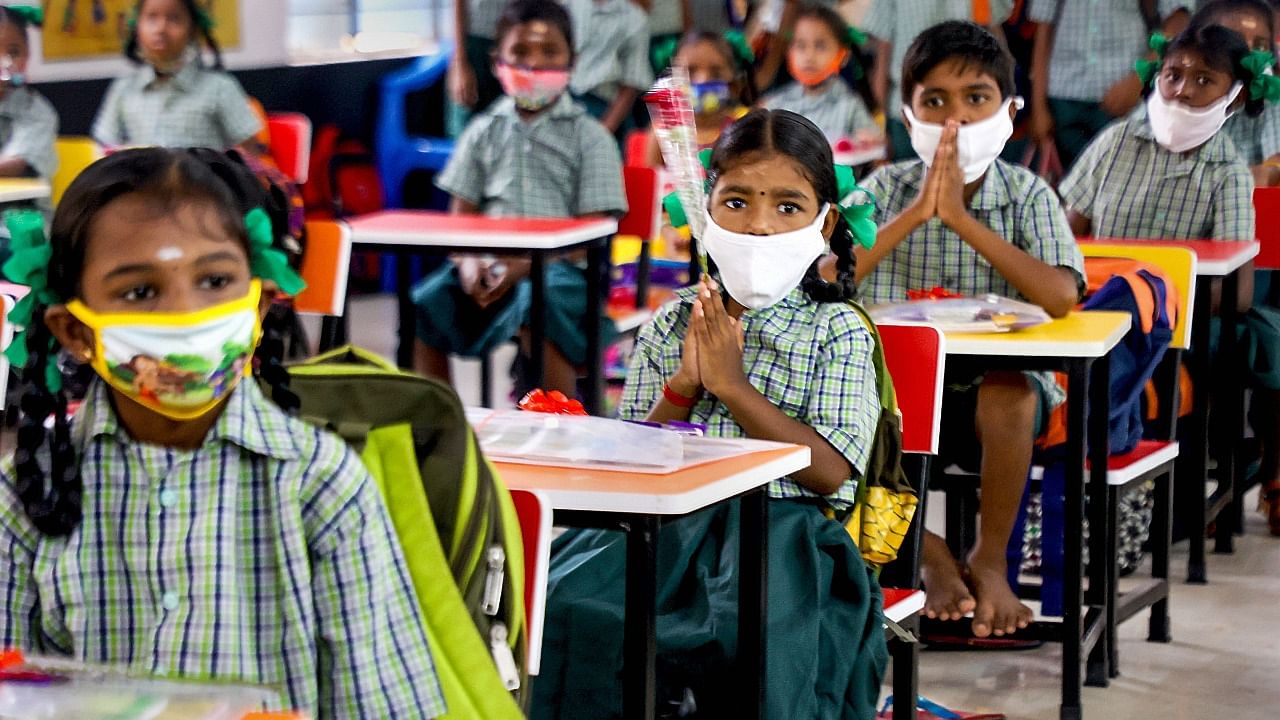 Students attend a class at a school, in Chennai, Monday. Credit: PTI Photo
