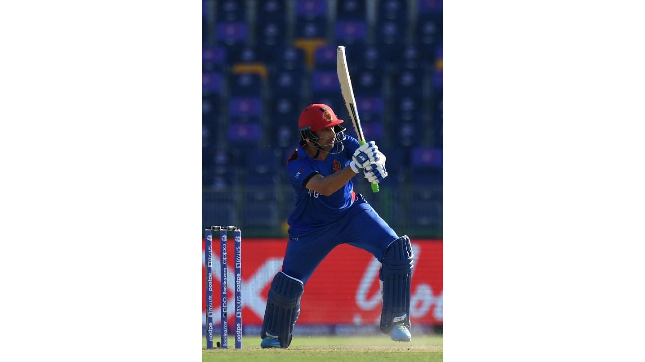 Afghanistan's Asghar Afghan plays a shot during the ICC men’s Twenty20 World Cup cricket match between Afghanistan and Namibia at the Sheikh Zayed Cricket Stadium in Abu Dhabi on October 31, 2021. Credit: AFP File Photo