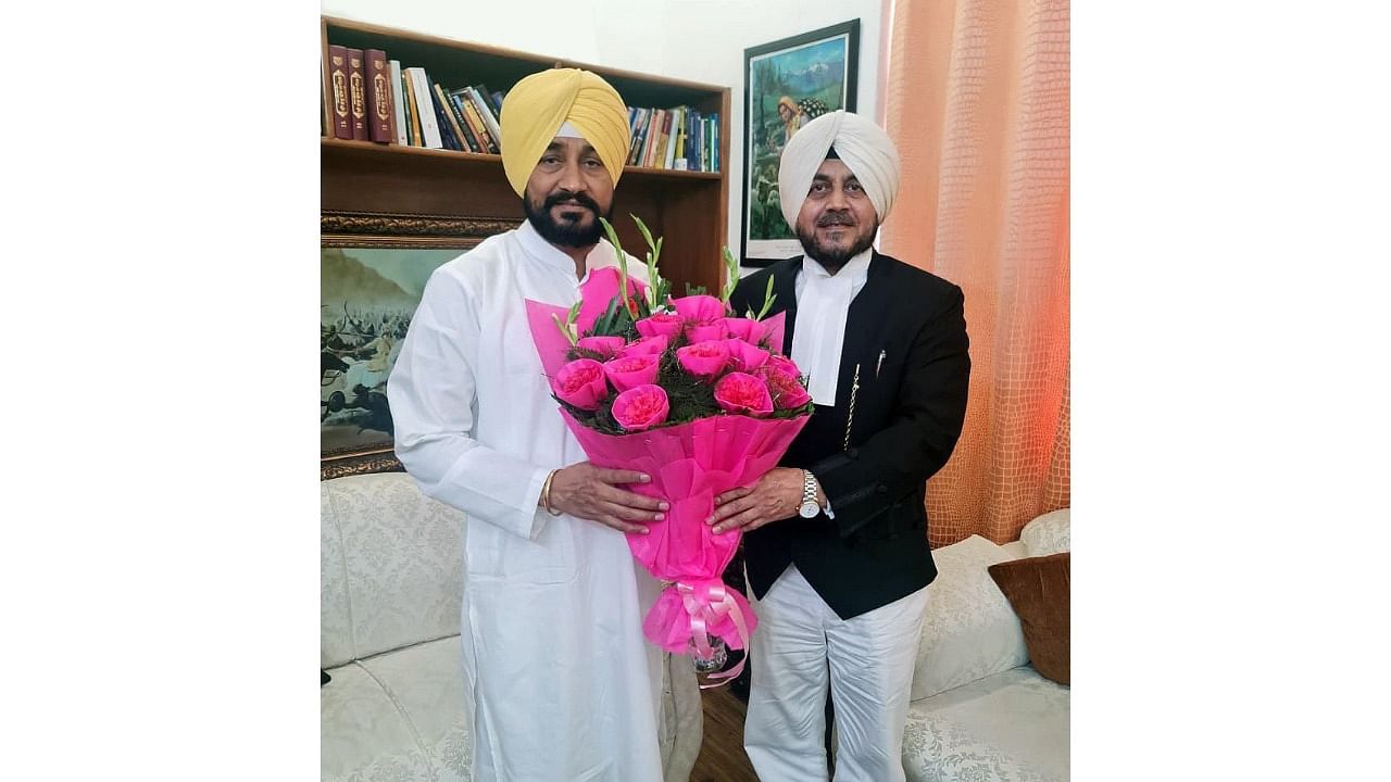 Punjab Attorney General A P S Deol (R) with CM Channi. Credit: Twitter/@CHARANJITCHANNI