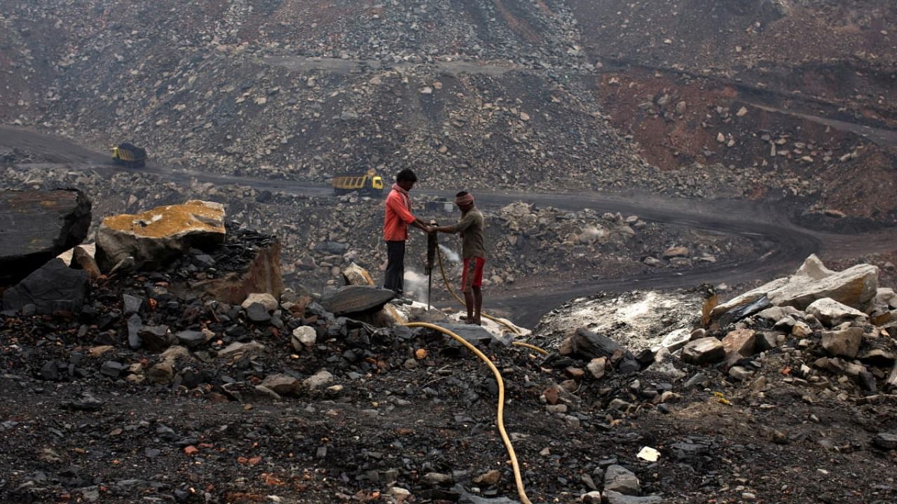 Workers drill at an open cast coal field at Dhanbad district in Jharkhand. Credit: Reuters file photo
