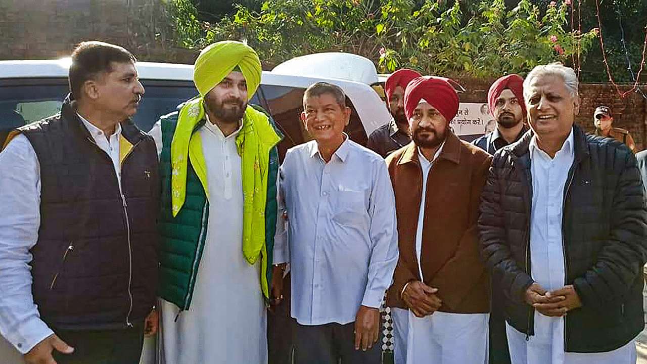 Punjab CM Charanjit Singh Channi, PPCC President Navjot Singh Sidhu, Congress Punjab in-charge Harish Chaudhary and Punjab Assembly Speaker Rana KP Singh. Credit: PTI Photo