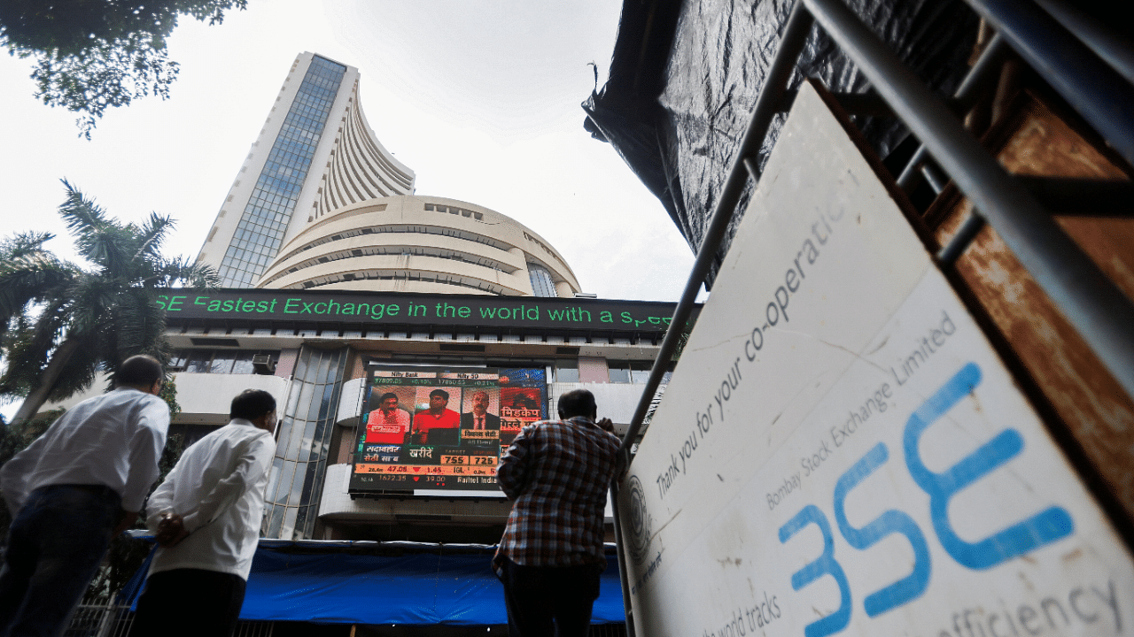 People stand outside the Bombay Stock Exchange (BSE). Credit: Reuters Photo