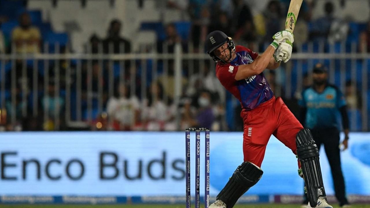 Jos Buttler plays a shot during the ICC men’s Twenty20 World Cup cricket match between England and Sri Lanka at the Sharjah Cricket Stadium. Credit: AFP Photo