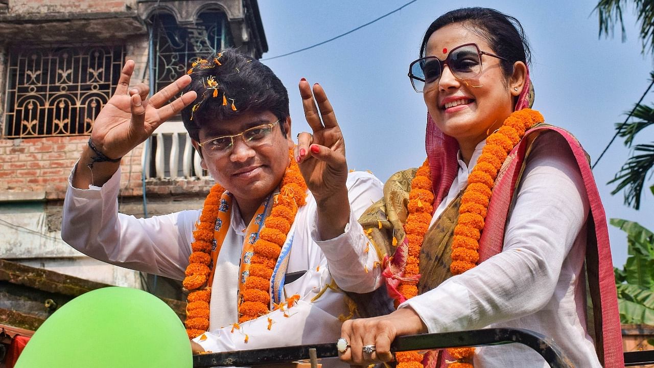 TMC MP Mahua Maitra campaigns with party candidate Braj Kishore Goswami for the Shantipur Assembly By-elections in Nadia. Credit: PTI File Photo