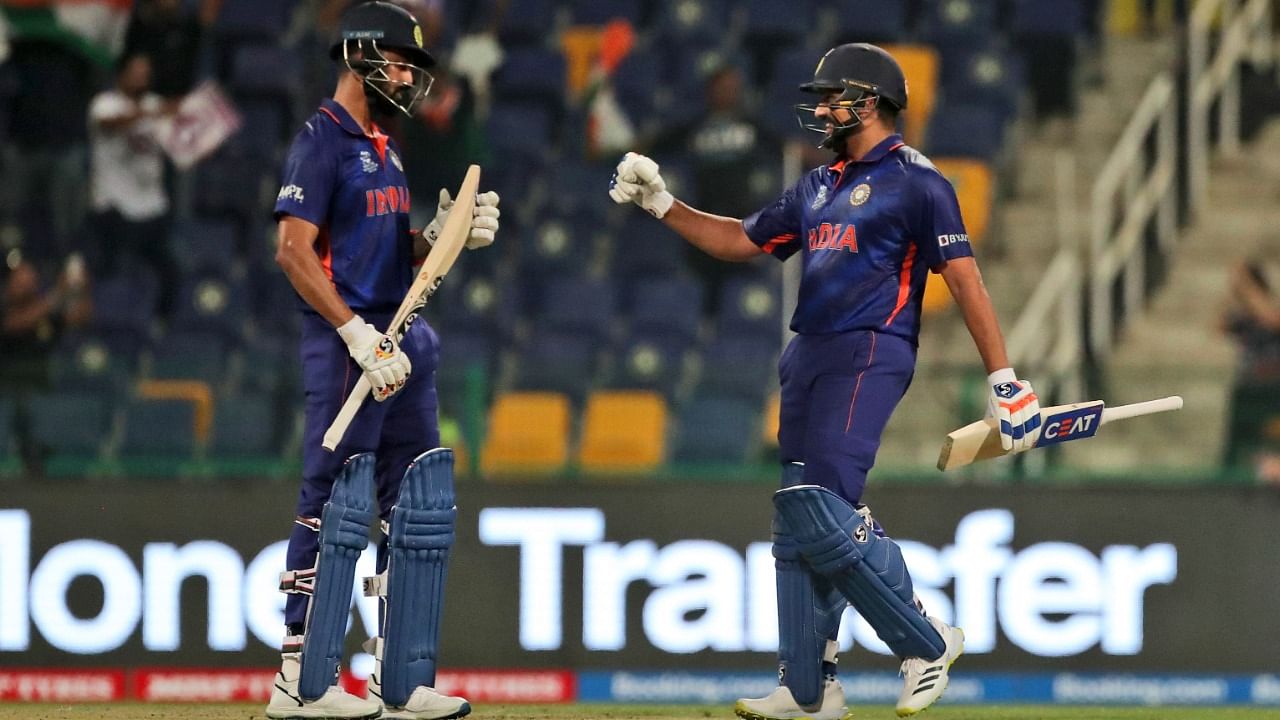 India's KL Rahul, left, and India's Rohit Sharma celebrate scoring runs during the Cricket Twenty20 World Cup match between India and Afghanistan in Abu Dhabi, UAE, Wednesday. Credit: AP/PTI Photo