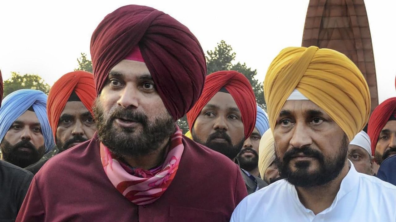 Punjab Congress president Navjot Singh Sidhu (left) and CM Charanjit Singh Channi. Credit: PTI file photo