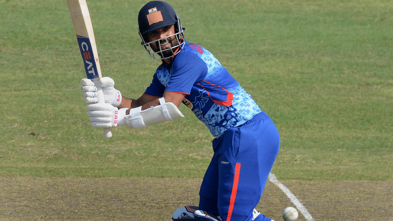 Ajinkya Rahane of Mumbai cricket team plays a shot during a match against Services cricket team at the Syed Mushtaq Ali Trophy 2021. Credit: PTI Photo