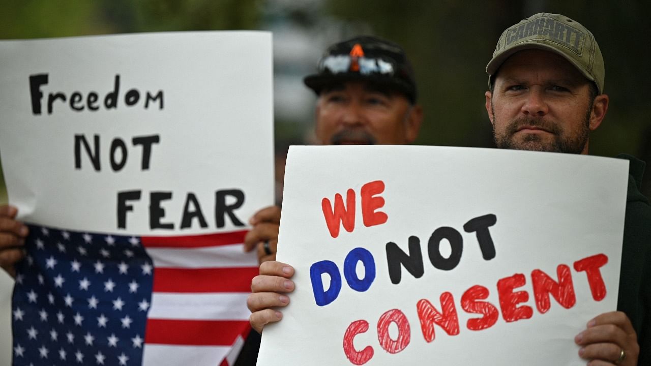 Citizens protest against the vaccine mandate. Credit: AFP Photo