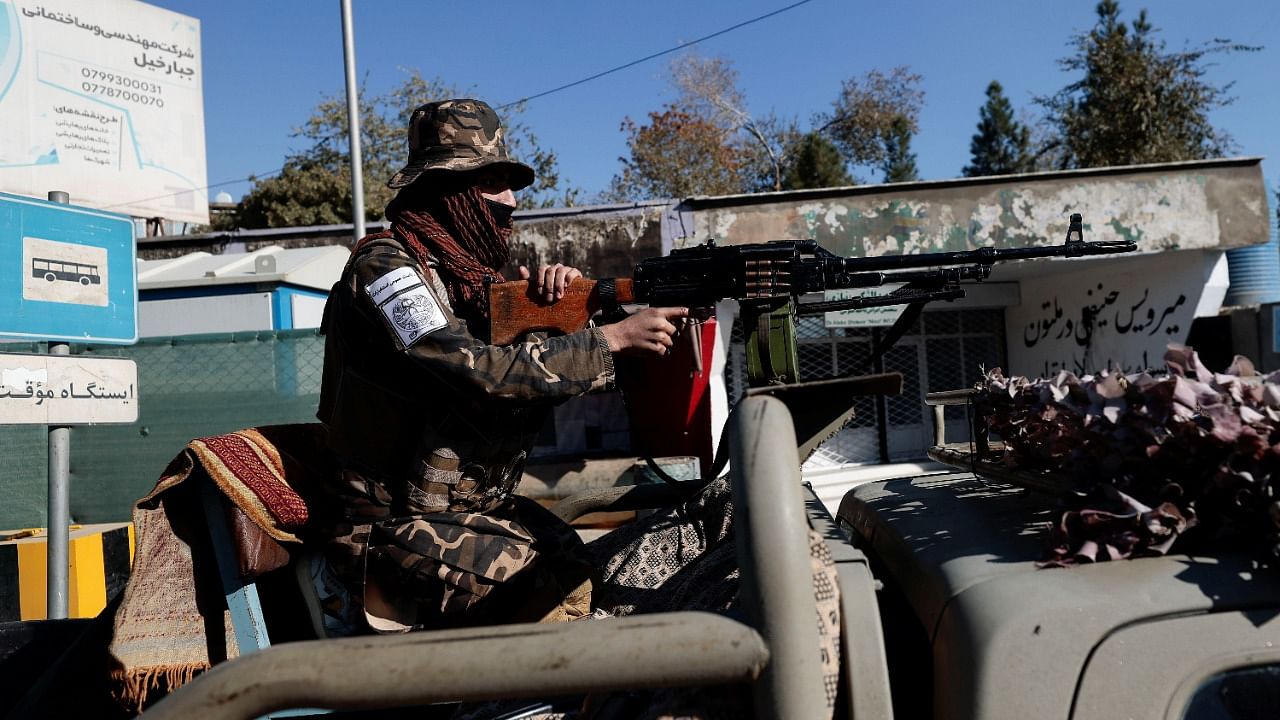 Taliban fighter stands watch at a checkpoint in Kabul. Credit: Reuters File Photo