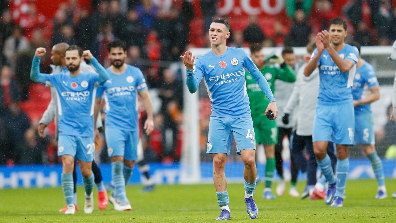 Manchester City's Phil Foden celebrates with teammates after the match. Credit: Reuters Photo