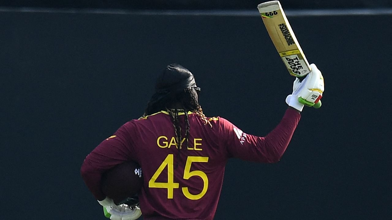 West Indies' Chris Gayle gestures as he walks back to the pavilion after his dismissal during the ICC men’s Twenty20 World Cup cricket match between Australia and West Indies. Credit: AFP Photo