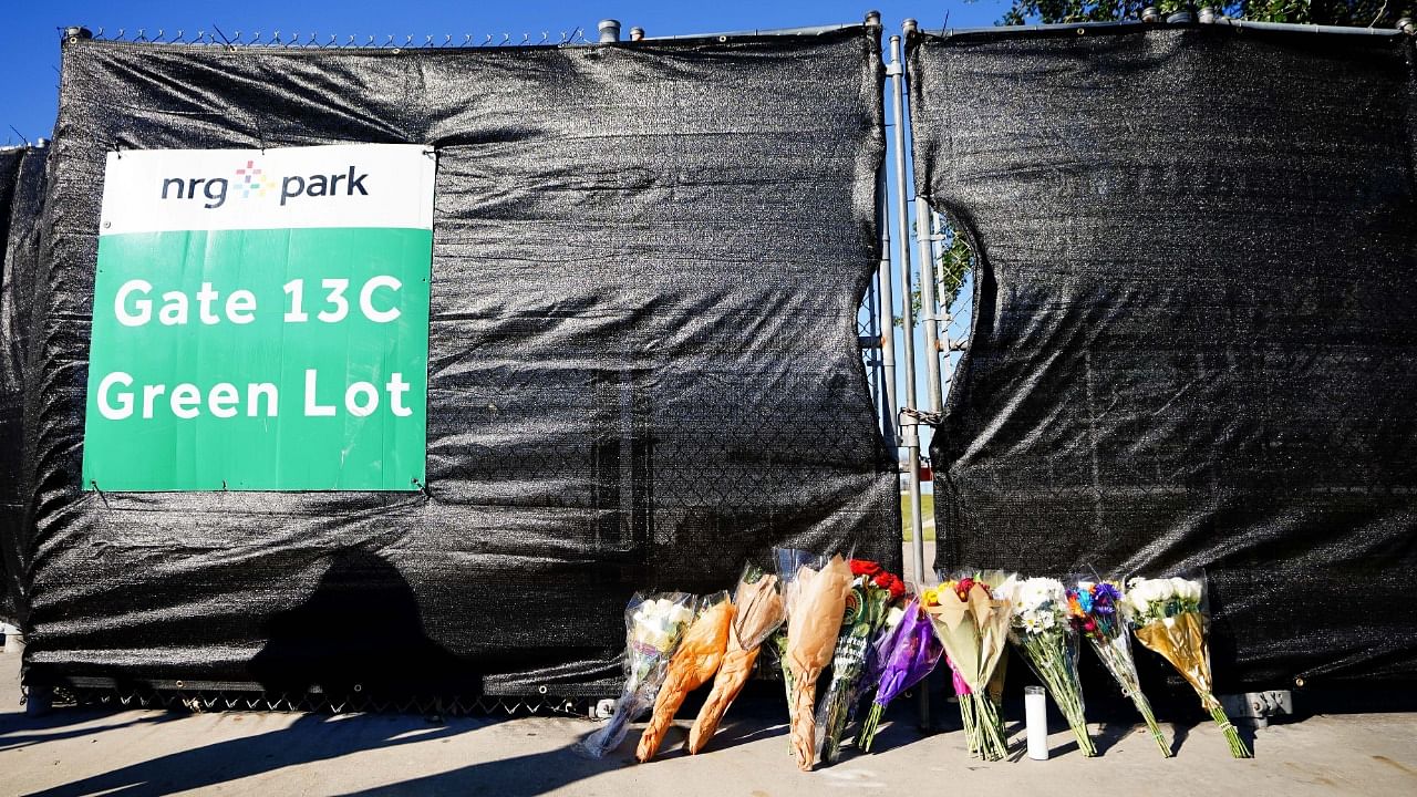 Flowers are seen outside of the canceled Astroworld festival at NRG Park on November 7, 2021 in Houston, Texas. Credit: AFP Photo