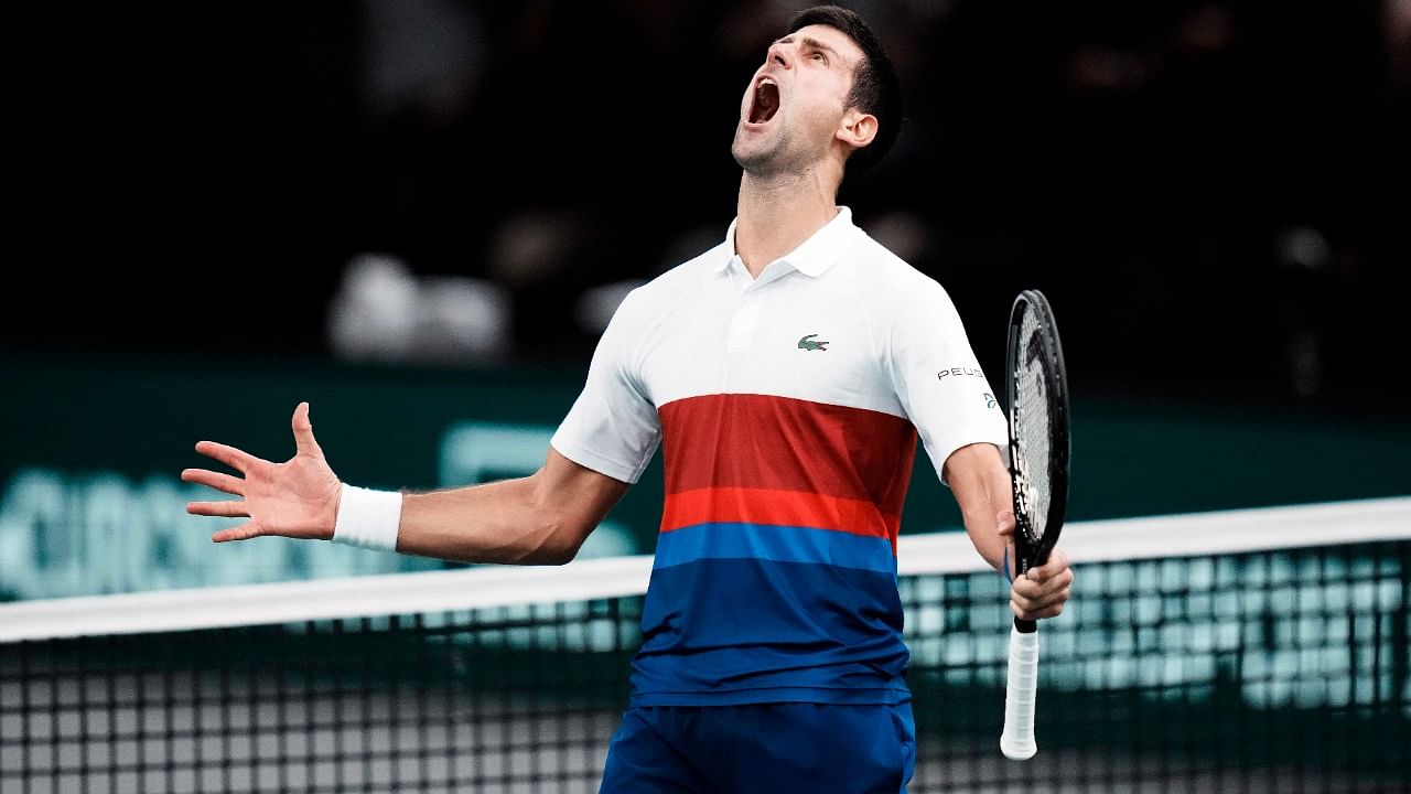 Novak Djokovic of Serbia celebrates his win over Hubert Hurkacz of Poland, during their semifinal match at the Paris Masters tennis tournament at the Accor Arena, in Paris, France. Credit: AP/PTI File Photo