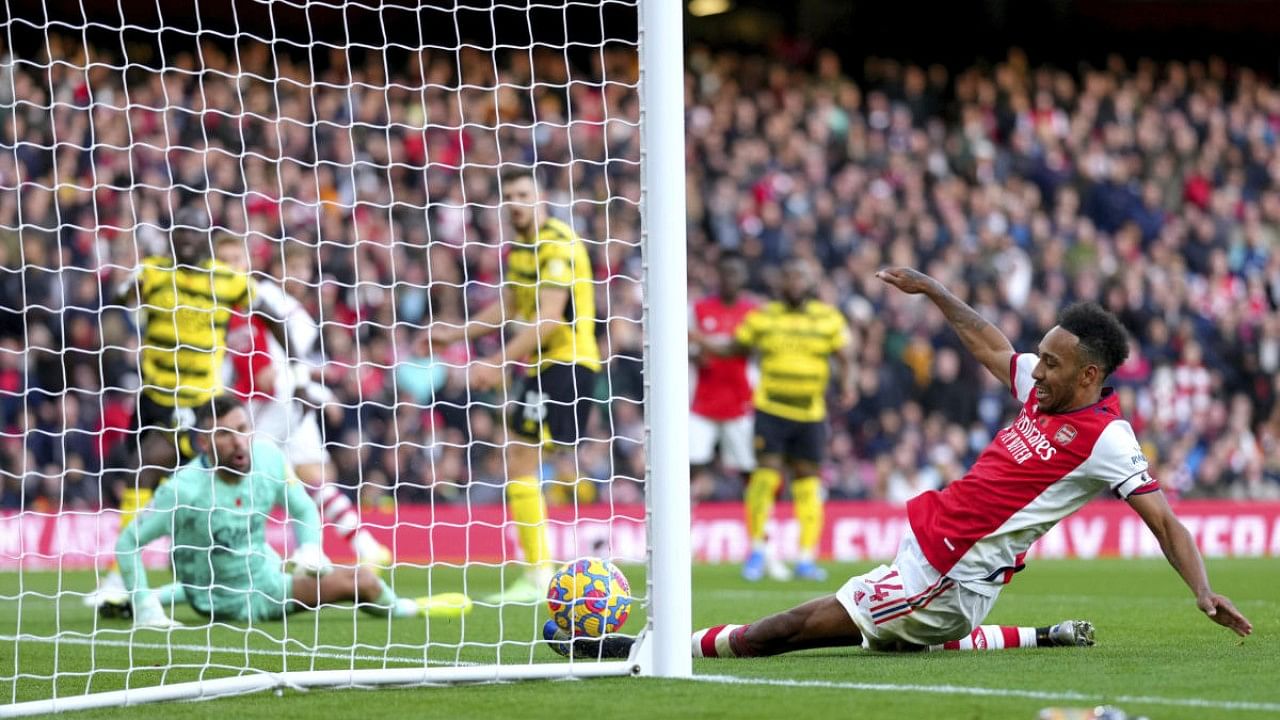 Arsenal's Pierre-Emerick Aubameyang scores a goal before it is then overruled for offside, during the English Premier League soccer match between Arsenal and Watford. Credit: AP Photo