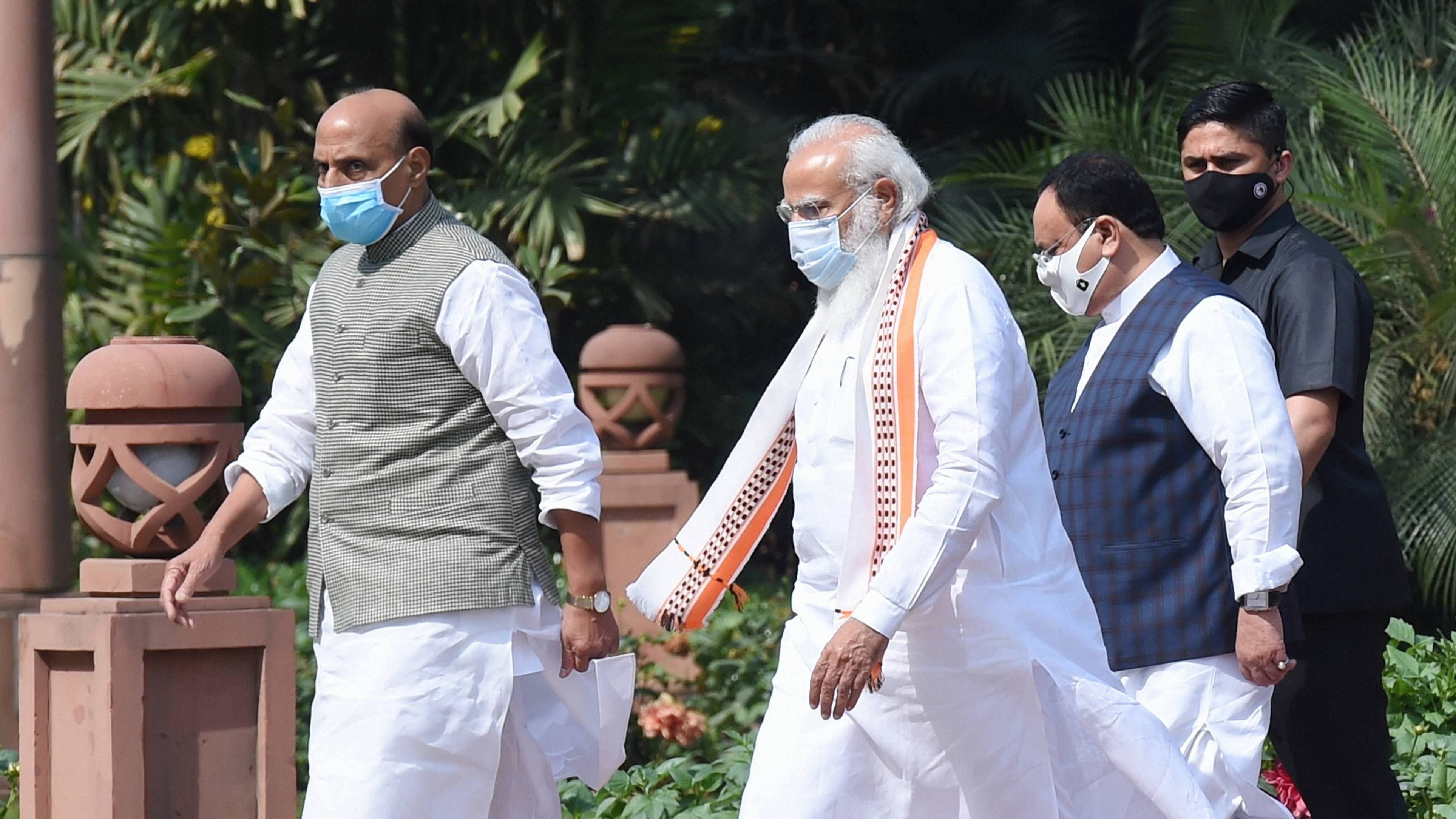 Prime Minister Narendra Modi, Defence Minister Rajnath Singh and BJP National President JP Nadda. Credit: PTI File Phoo