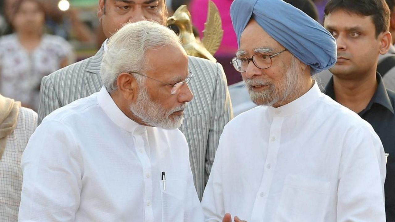 PM Narendra Modi (L) and Manmohan Singh (R). Credit: PTI File Photo