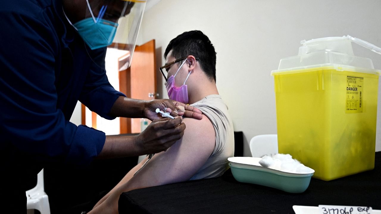 Australia's vaccination rate has picked up pace since July, after widely missing its initial targets. Credit: AFP File Photo
