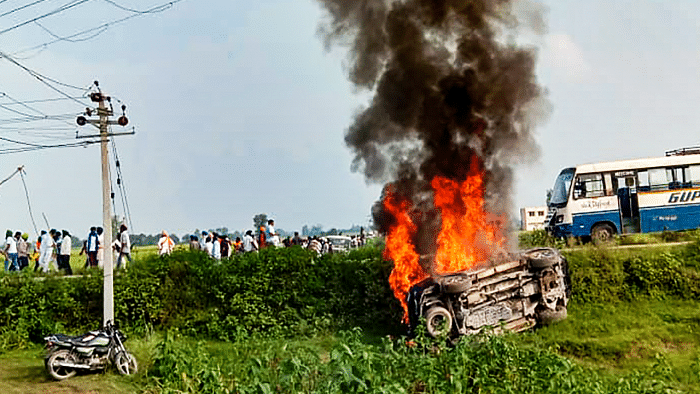 As many as eight people, including four farmers, were killed on October 3, when a car allegedly ferrying the Union Minister Ajay Mishra's son ran over a group of protesters, gathered to oppose a programme attended by Uttar Pradesh's Deputy Chief Minister Keshav Prasad Maurya in Lakhimpur Kheri. Credit: PTI Photo