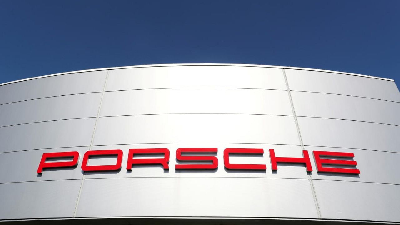 A logo of Porsche is seen outside a Porsche car dealer. Credit: Reuters Photo