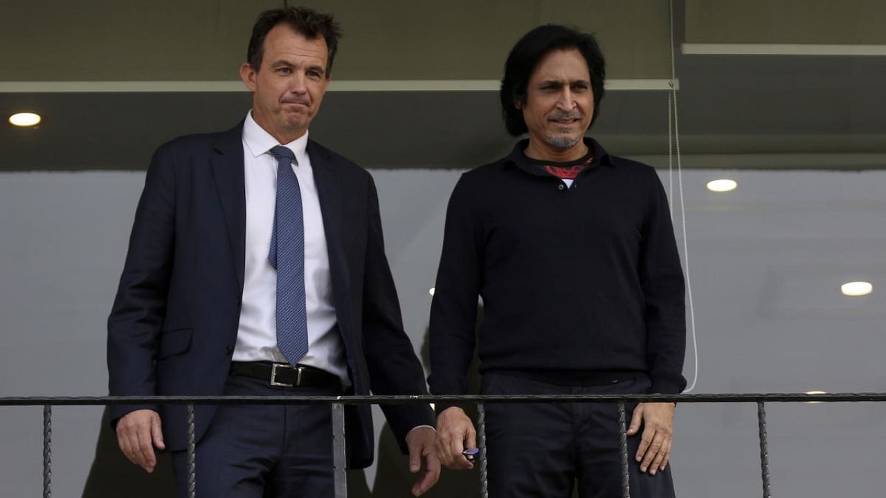 England and Wales Cricket Board's chief executive Tom Harrison, left, stands with Pakistan Cricket Board Chairman Ramiz Raja, right, at Gaddafi Stadium during his visit PCB's head office in Lahore. Credit: AP/PTI Photo