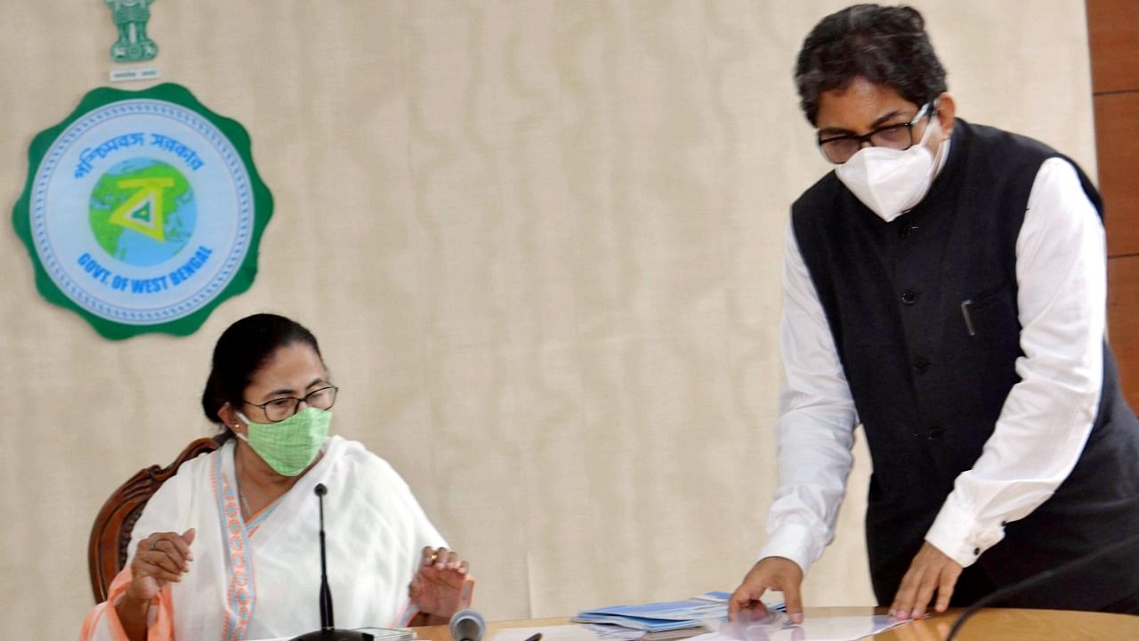 WB CM Mamata Banerjee and her advisor Alapan Bandyopadhyay during a meeting, in Kolkata. Credit: PTI File Photo