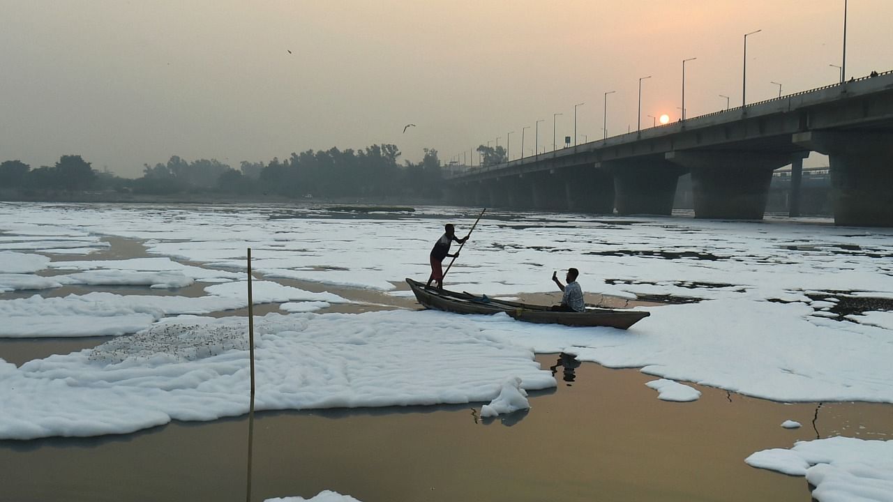 The reason behind frothing in Yamuna is high phosphate content in detergents used in dyeing industries, dhobi ghats. Credit: PTI Photo