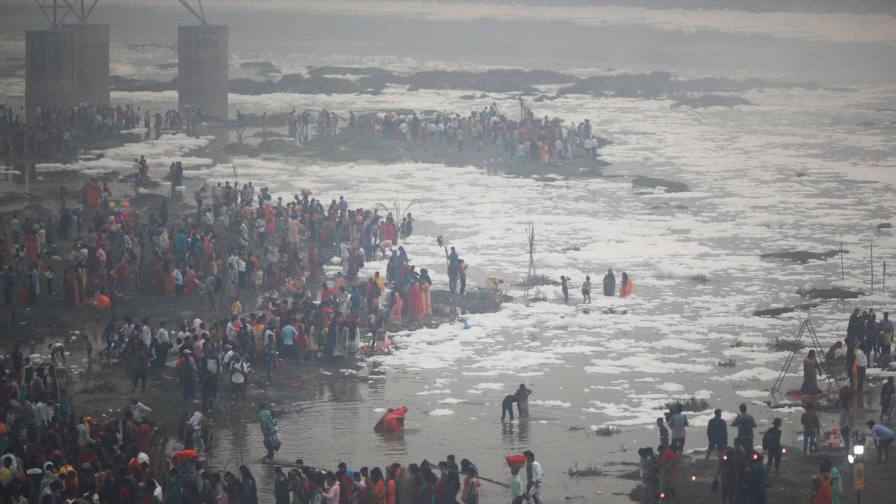 Last month, the Delhi Disaster Management Authority (DDMA) had allowed Chhath puja at designated ghats, but prohibited it at the Yamuna banks. Credit: Reuters Photo