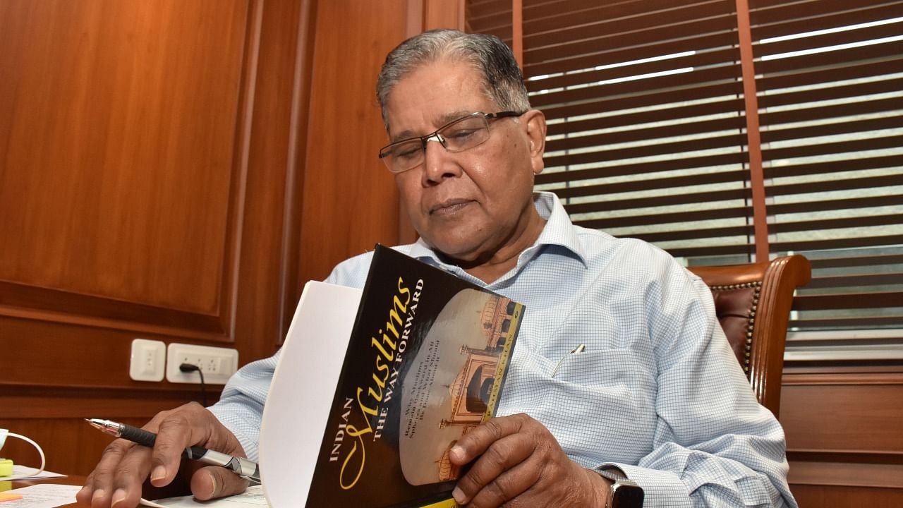 Former Rajya Sabha Deputy Chairman and Congress leader Rahman Khan with his new book 'Indian Muslims: The Way Forward'. Credit: DH Photo/B H Shivakumar