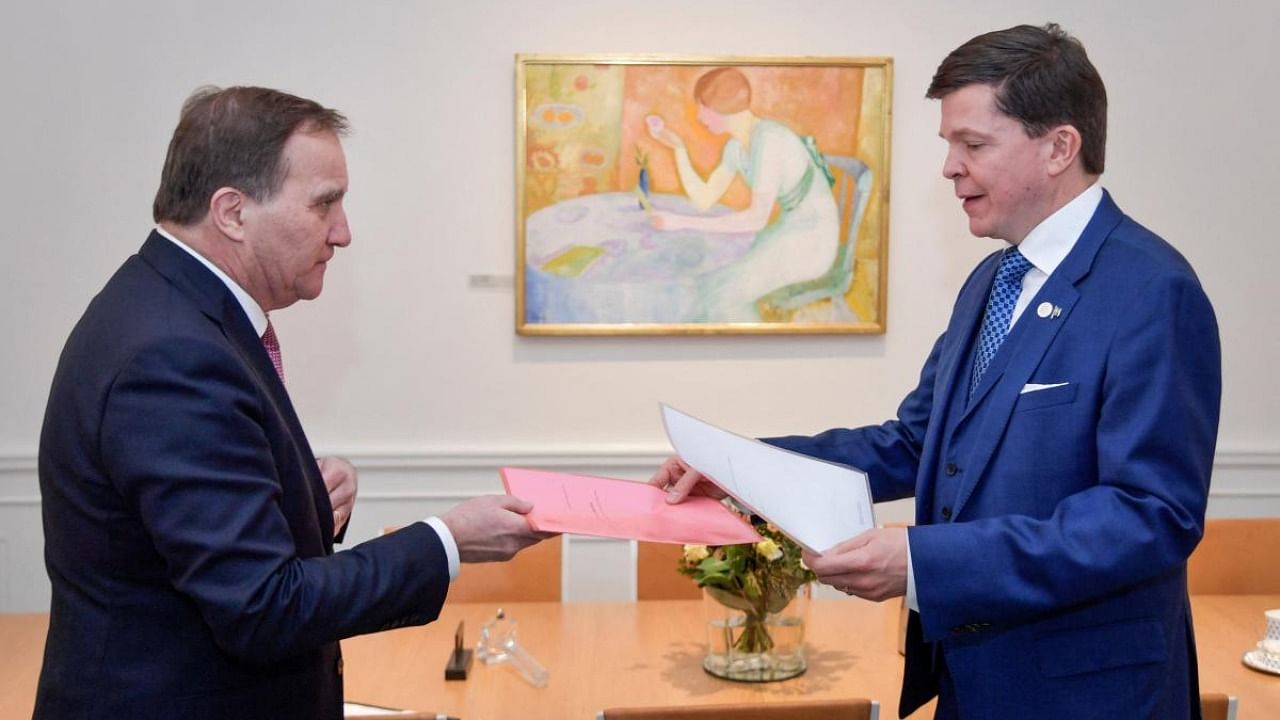 Swedish Prime Minister Stefan Lofven (L) hands in his resignation to the speaker of parliament Andreas Norlen at the parliament (Riksdagen) in Stockholm, Sweden. Credit: AFP Photo