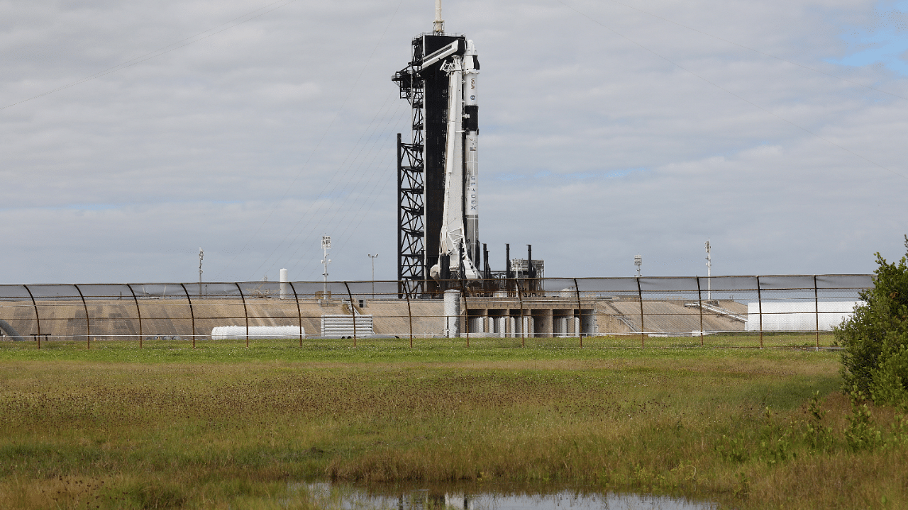 A SpaceX Falcon 9 rocket stands on the launch pad as it is prepared for launch to the International Space Station. Credit: Reuters Photo